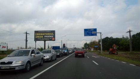 Drum în lucru: Traficul rutier prin Oşorhei, blocat de lucrări la alveolele de calmare a traficului pe DN 1 (FOTO/VIDEO)