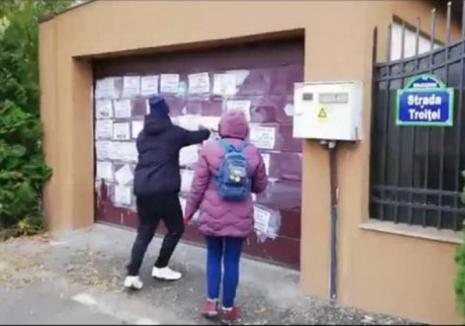 Mesaje obscene pe poartă: Mai mulţi protestatari #rezist au vandalizat vila lui Florin Iordache (VIDEO)