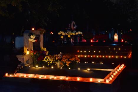 Ziua Morţilor. Orădenii au aprins lumânări în cimitirul municipal, la mormintele celor dragi (FOTO)