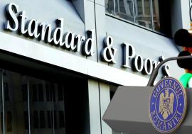 S&P menține ratingul României peste „junk”, dar păstrează perspectiva negativă. Bolojan avertizează asupra blocajului politic